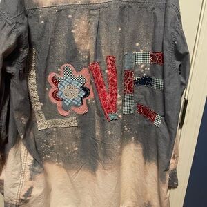 Hand bleached up-cycled shirt. Size 2xl.  Hand sewn appliqués